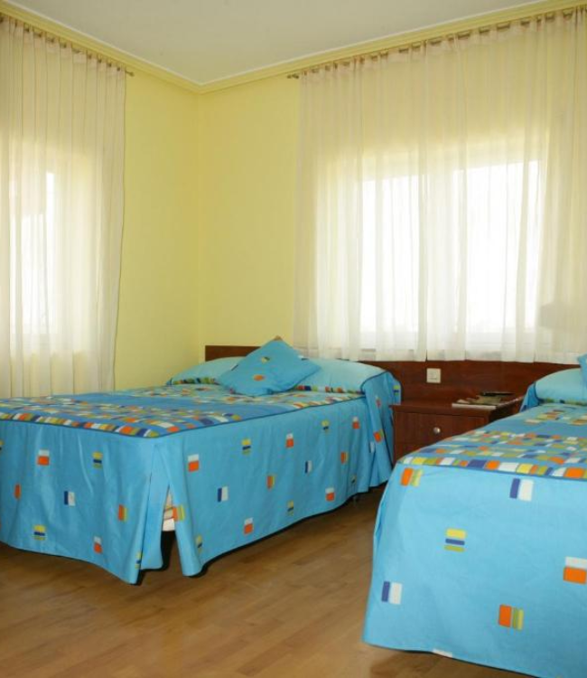 Hostal Restaurante Delfín - camas hostal en Astorga